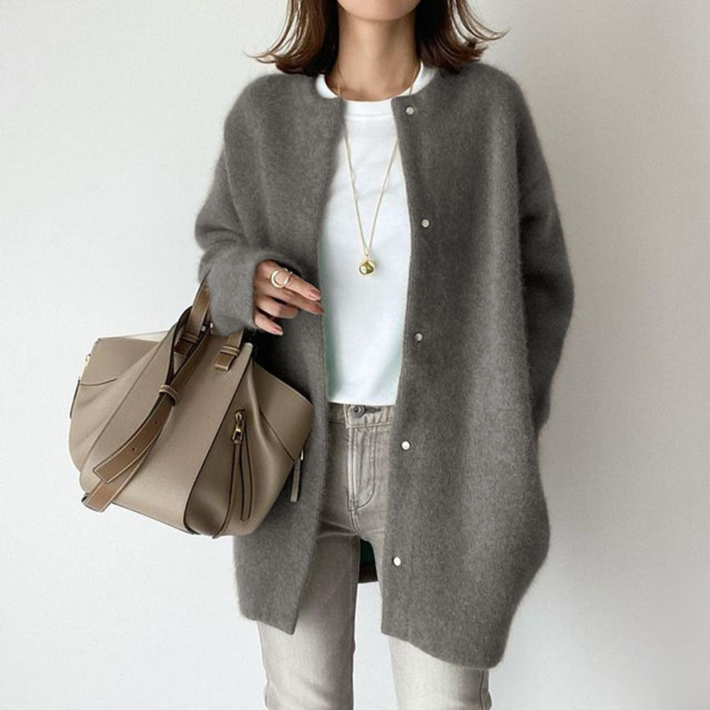 Woman in long fuzzy knit cardigan