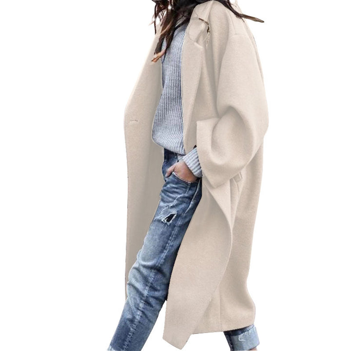 Woman wearing long oversized lapel coat
