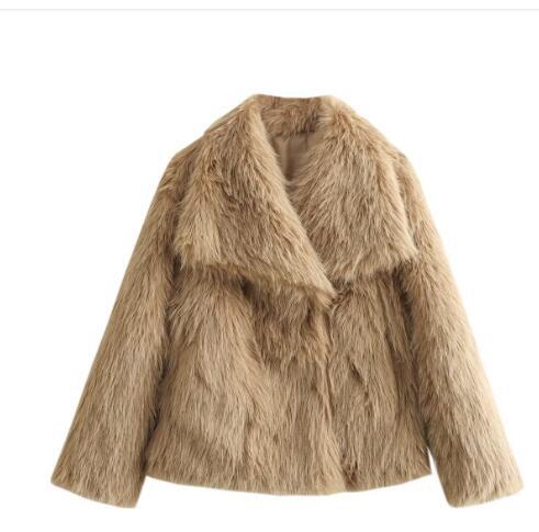 Woman in cropped fluffy faux fur jacket