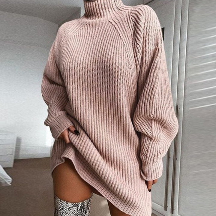 Woman in oversized roll neck jumper dress