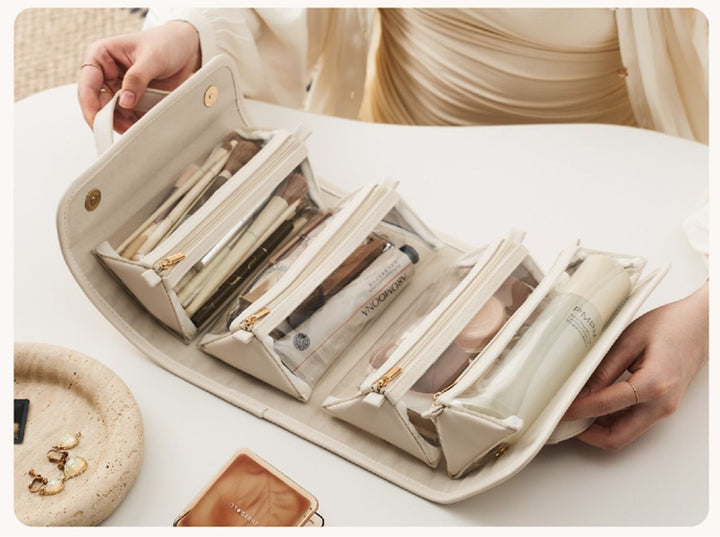 Foldable travel toiletry bag with clear pouches