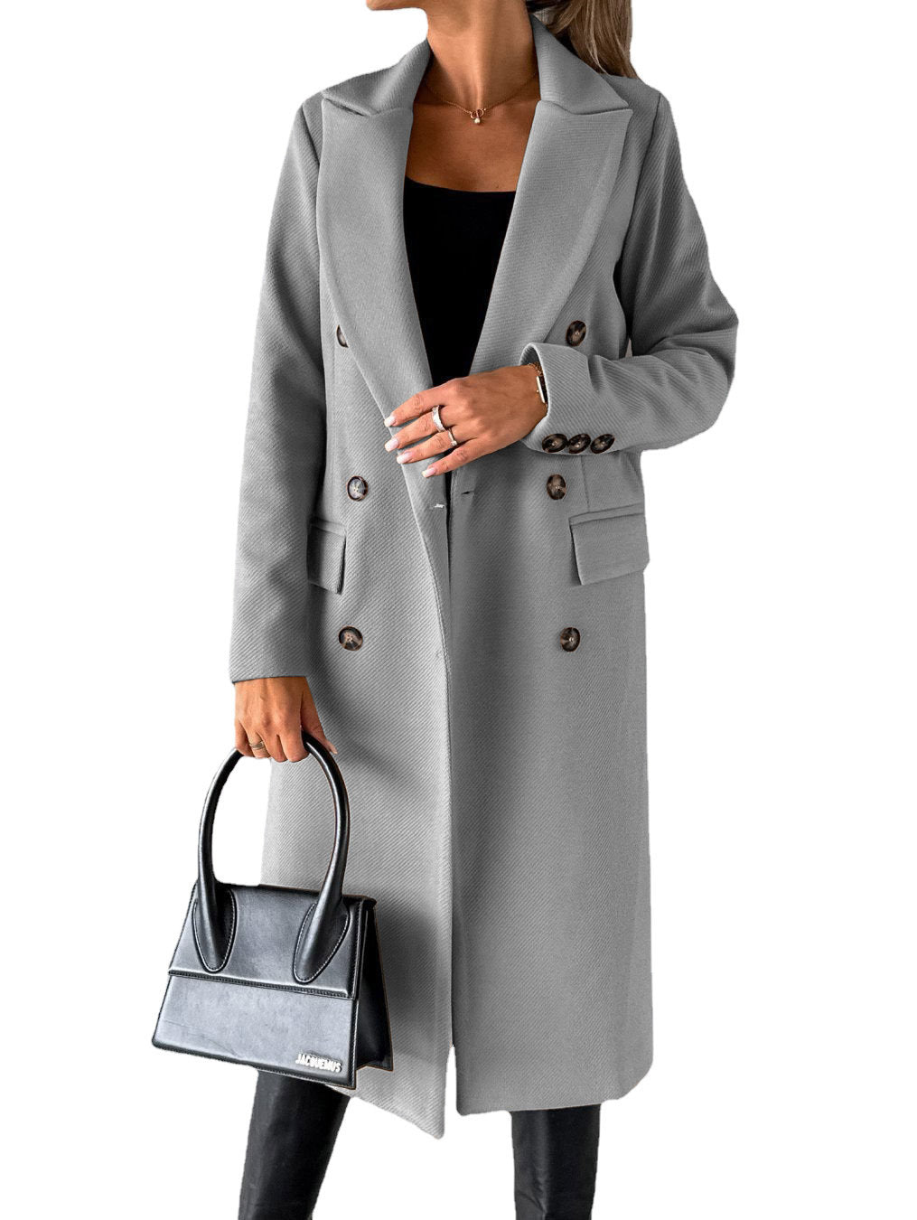 Woman in long double-breasted coat