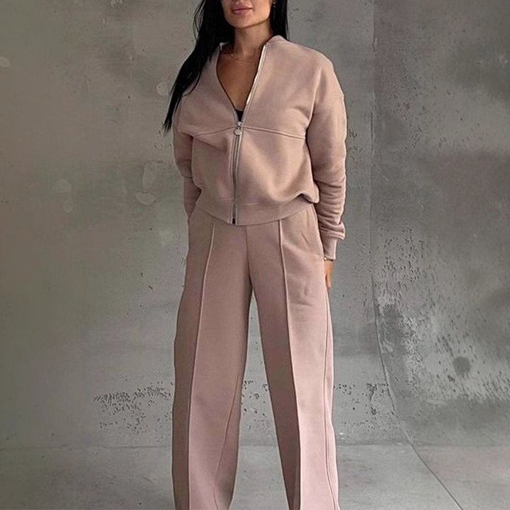 Woman in a zip jacket and wide-leg trousers set