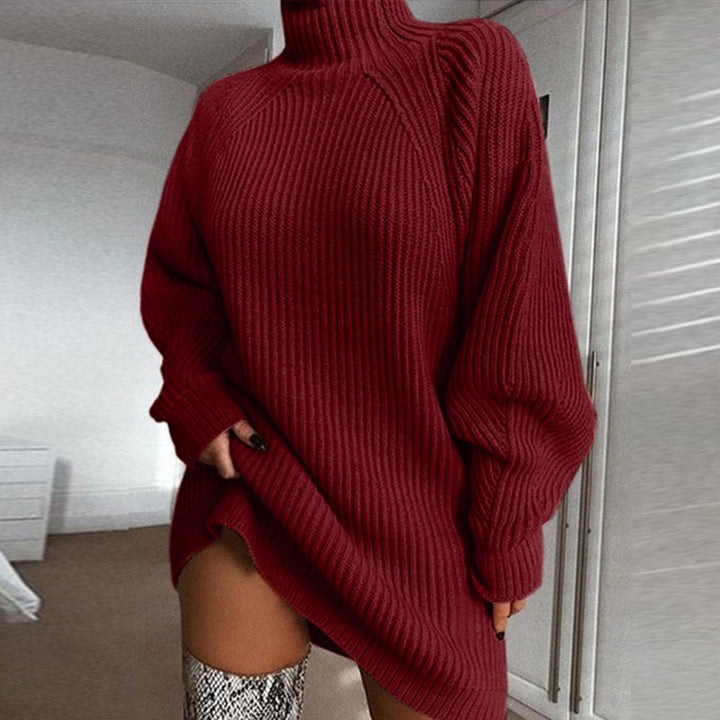 Woman in oversized roll neck jumper dress
