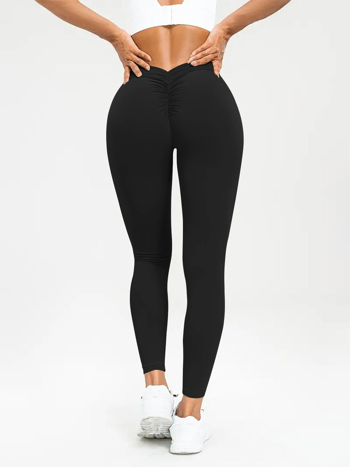 Woman in high-waisted scrunch bum leggings
