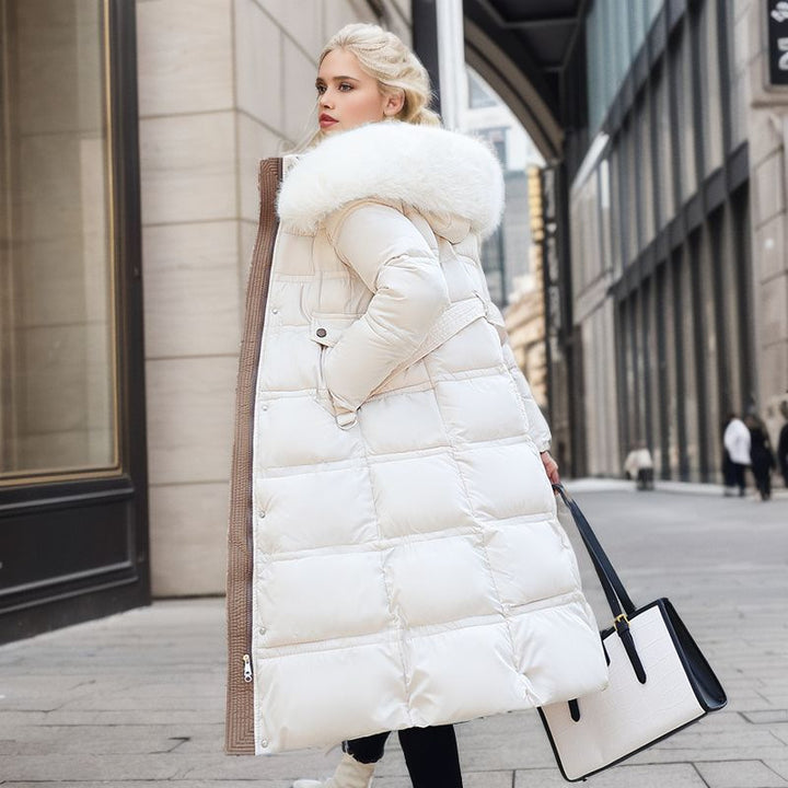 Woman in a long parka with faux fur hood