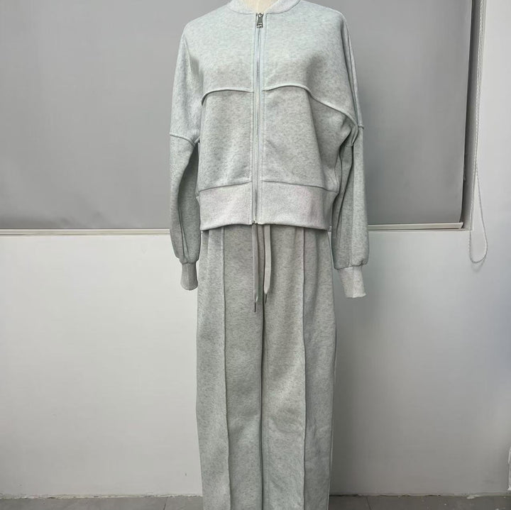 Woman in a zip jacket and wide-leg trousers set