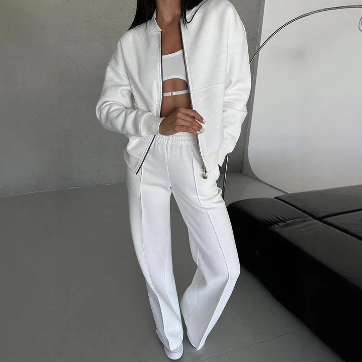 Woman in a zip jacket and wide-leg trousers set