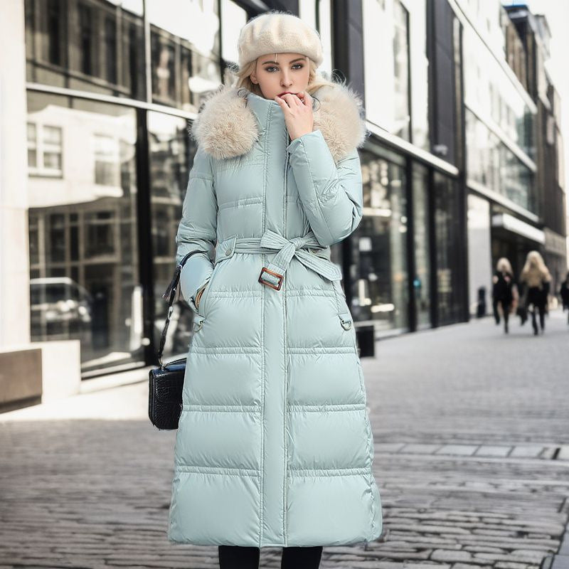 Woman in a long parka with faux fur hood