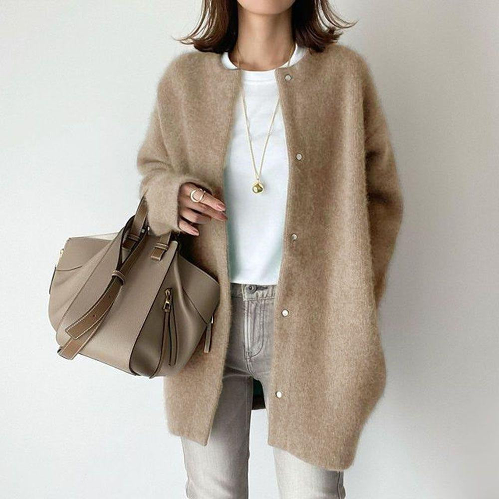 Woman in long fuzzy knit cardigan