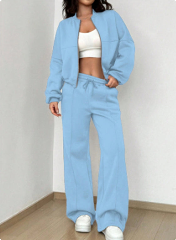 Woman in a zip jacket and wide-leg trousers set