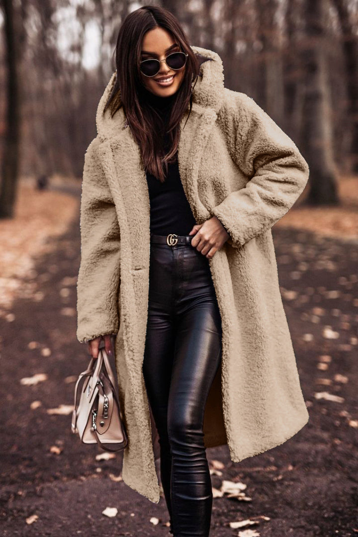 Woman in long hooded teddy coat
