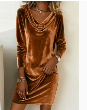 Woman in a velvet cowl-neck mini dress