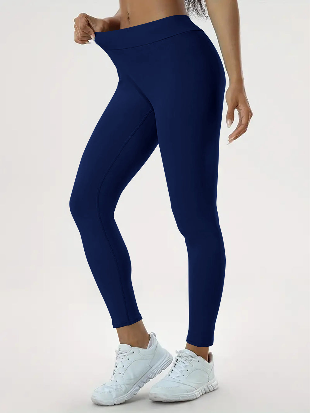 Woman in high-waisted scrunch bum leggings