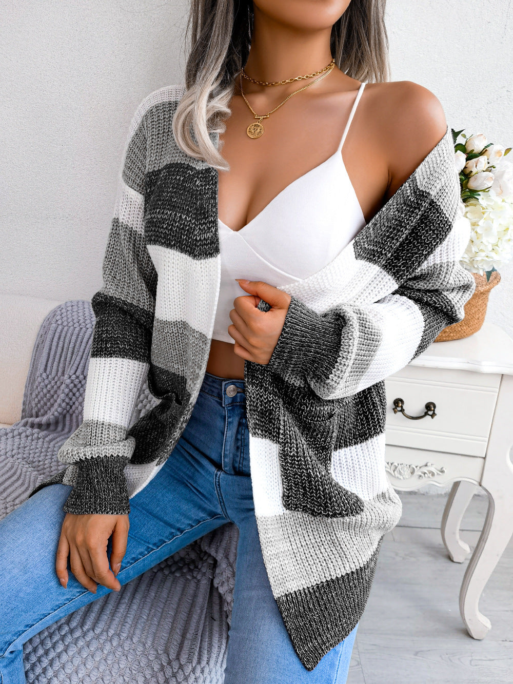 Woman in striped open-front cardigan