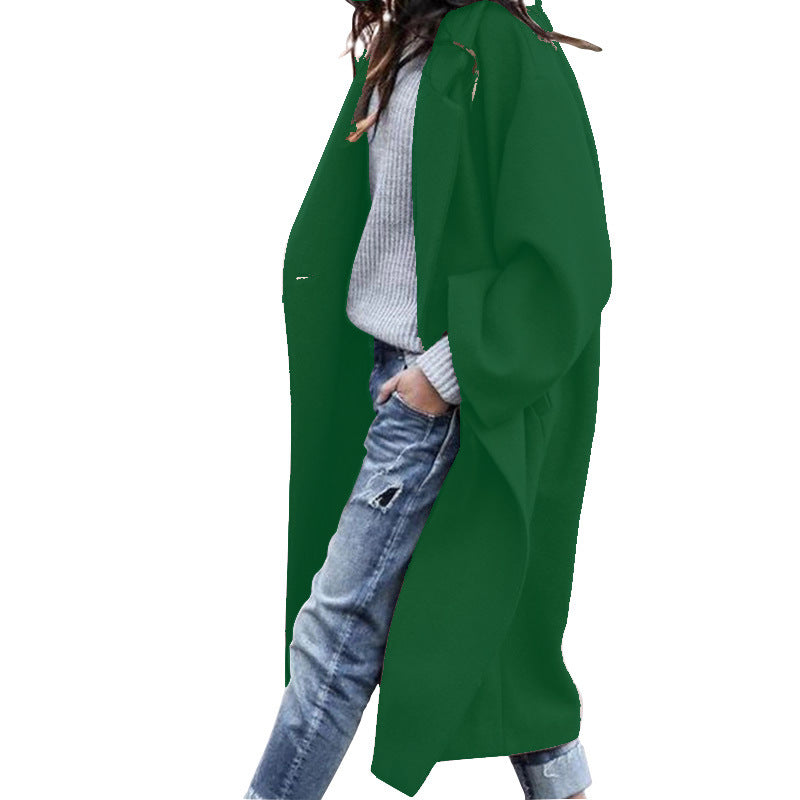 Woman wearing long oversized lapel coat