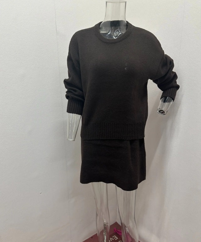 Woman in matching knitted jumper and mini skirt