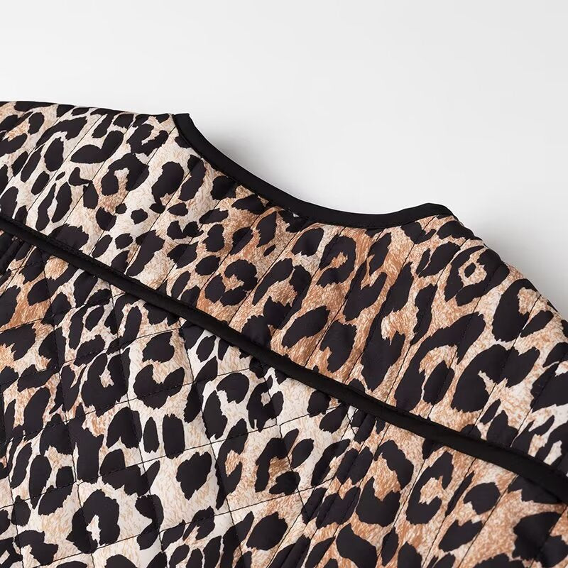 Women’s short jacket with all-over leopard print, round neckline and contrasting piping