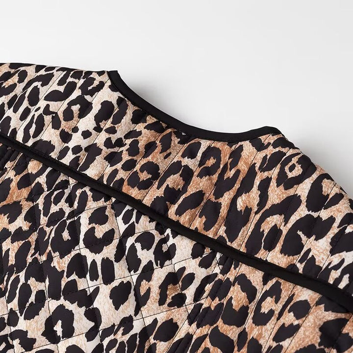 Women’s short jacket with all-over leopard print, round neckline and contrasting piping