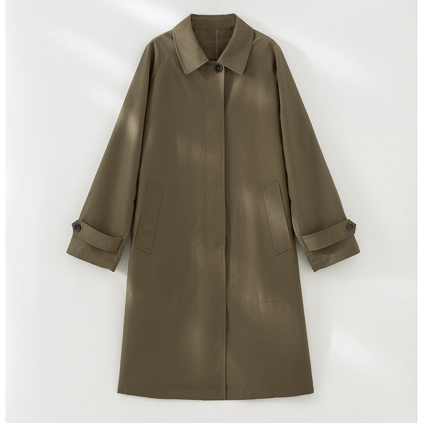 Women Longer minimalist trench coat with concealed button placket and adjustable cuffs
