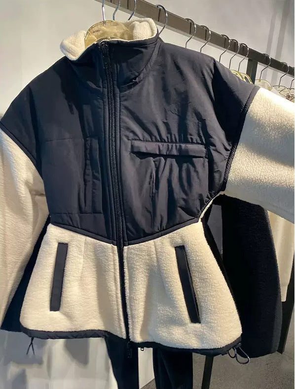 Ladies hybrid fleece jacket with padded top, stand-up collar and tailored peplum