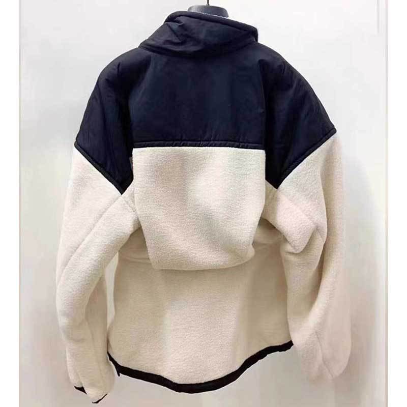Ladies hybrid fleece jacket with padded top, stand-up collar and tailored peplum