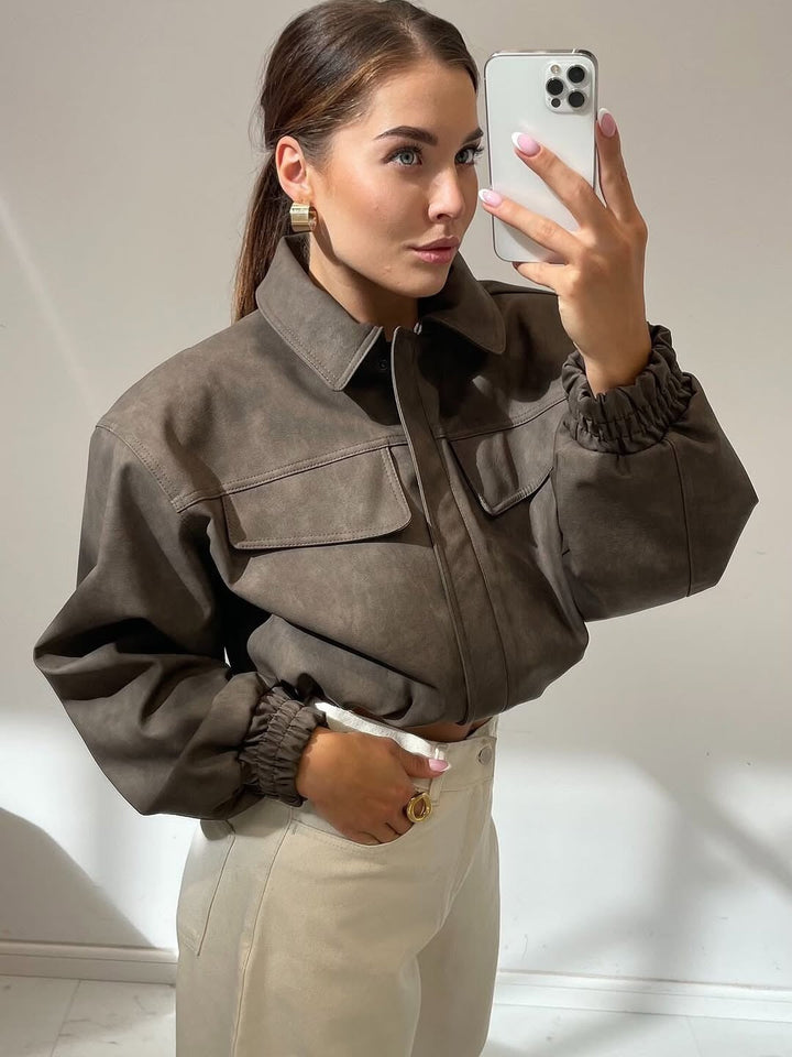 Women short cut faux leather jacket with patch chest pockets