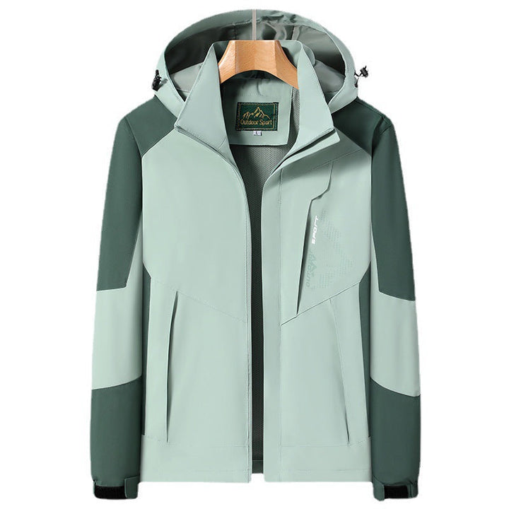 Women Softshell Trekking Jacket with breathable membrane, adjustable hood and colorblock design