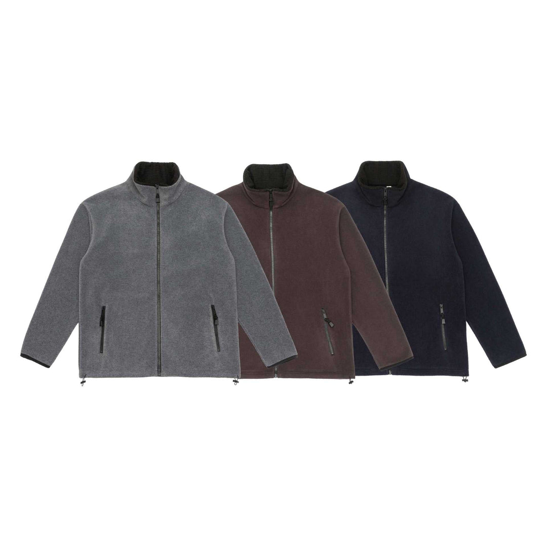 Unisex fleece jacket with stand-up collar, full-length zip and drawstring hem