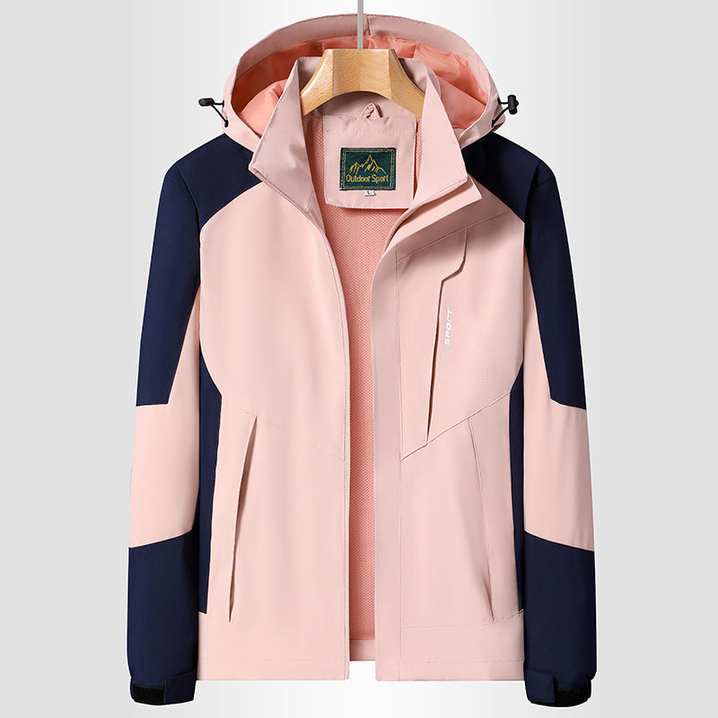 Women Softshell Trekking Jacket with breathable membrane, adjustable hood and colorblock design