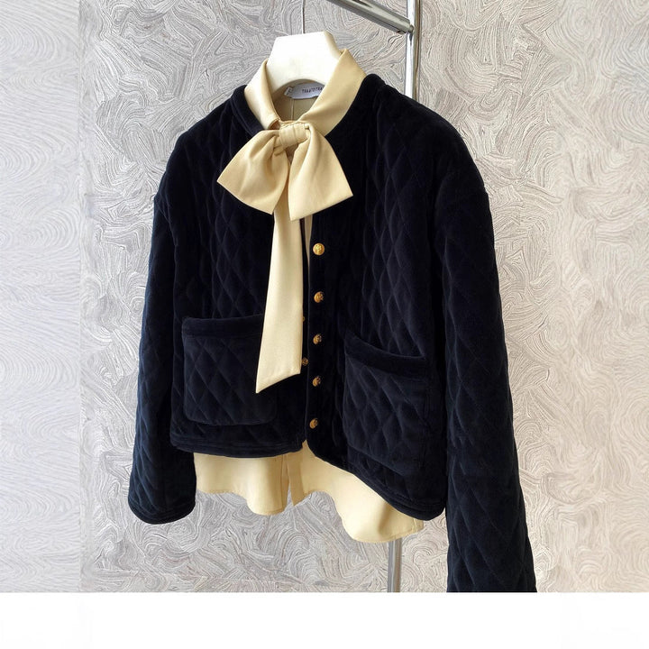 Ladies short cut quilted velvet cardigan with golden medallion buttons