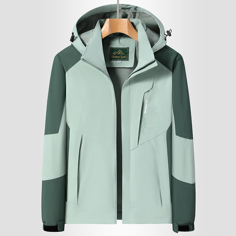 Women Softshell Trekking Jacket with breathable membrane, adjustable hood and colorblock design