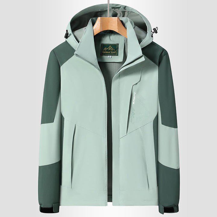 Women Softshell Trekking Jacket with breathable membrane, adjustable hood and colorblock design