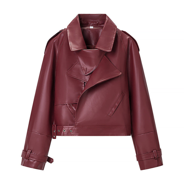 Women short cut biker jacket in leather look with asymmetrical lapel and waist belt
