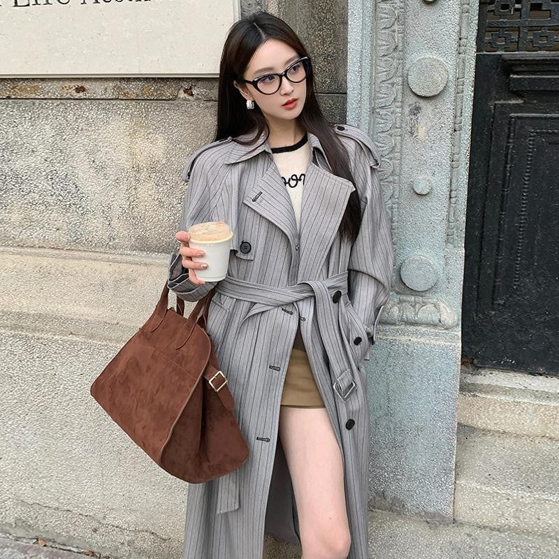 Women’s Long Pinstripe Trench Coat with Tie Belt Shoulder Straps and Flared Hem
