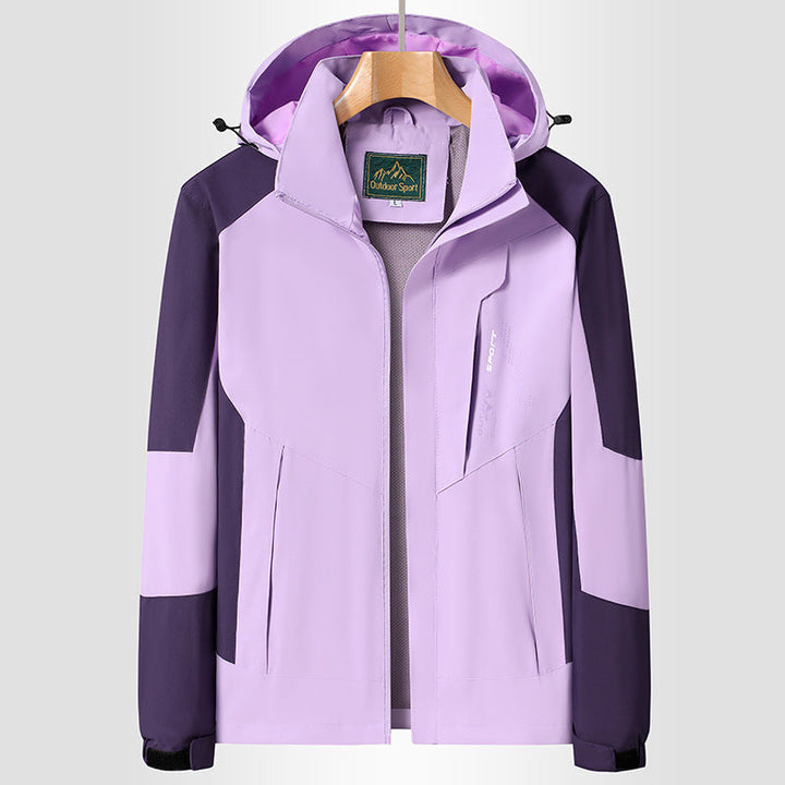 Women Softshell Trekking Jacket with breathable membrane, adjustable hood and colorblock design