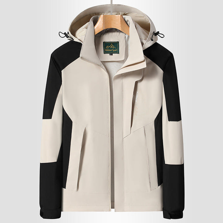 Women Softshell Trekking Jacket with breathable membrane, adjustable hood and colorblock design