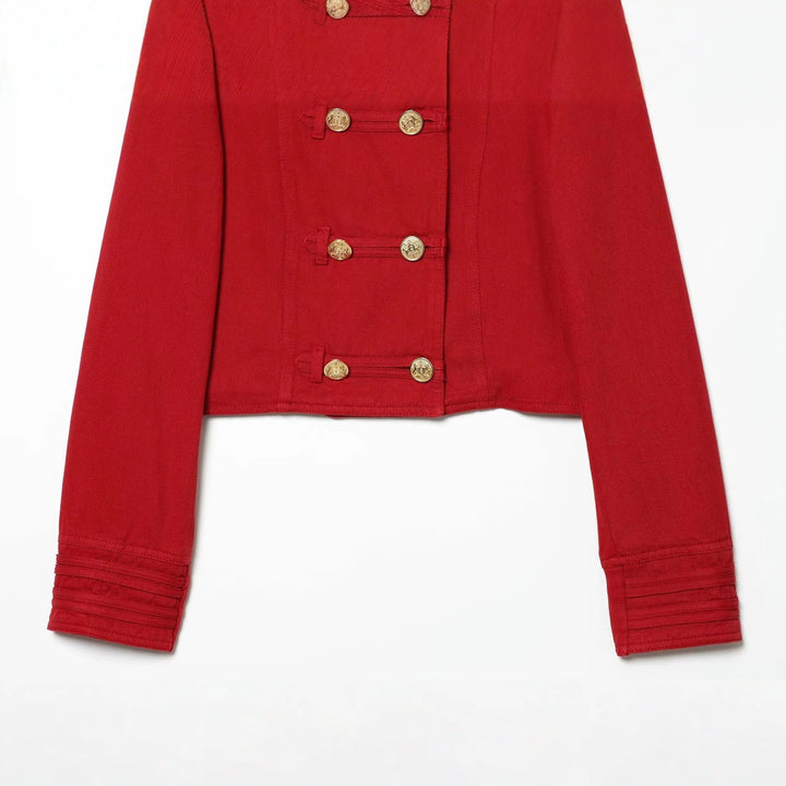Women’s short military-inspired jacket with decorative ornate buttons