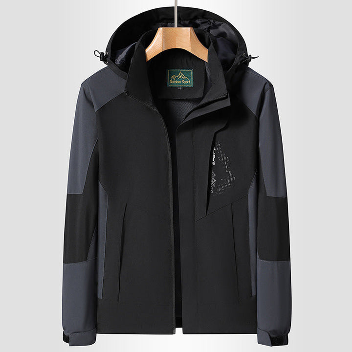 Women Softshell Trekking Jacket with breathable membrane, adjustable hood and colorblock design