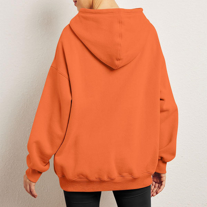 Woman in oversized fleece-lined hoodie