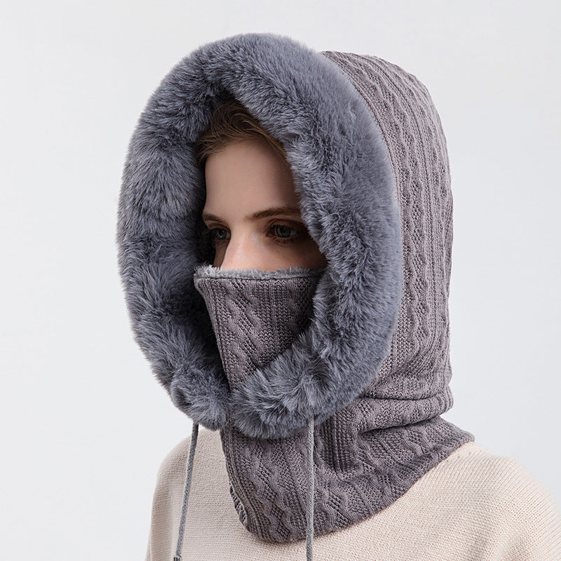 Knitted hood with faux fur trim