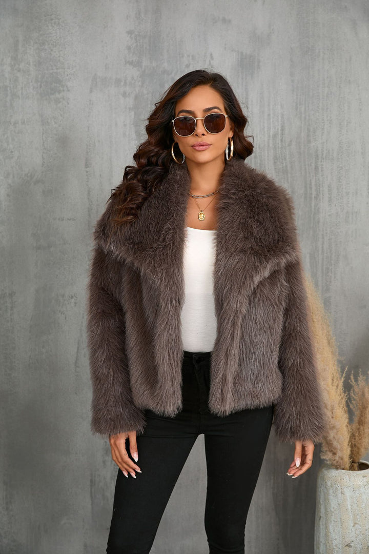 Woman in cropped fluffy faux fur jacket