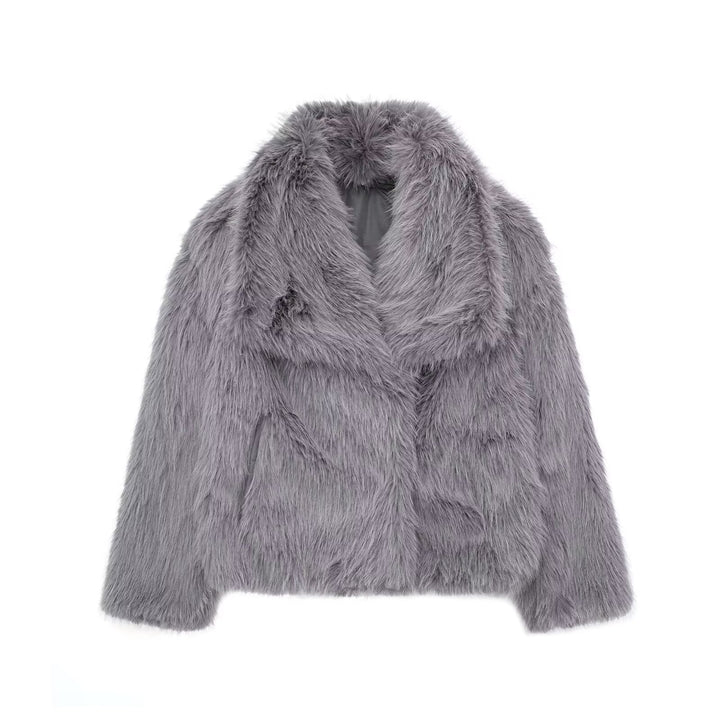 Woman in cropped fluffy faux fur jacket
