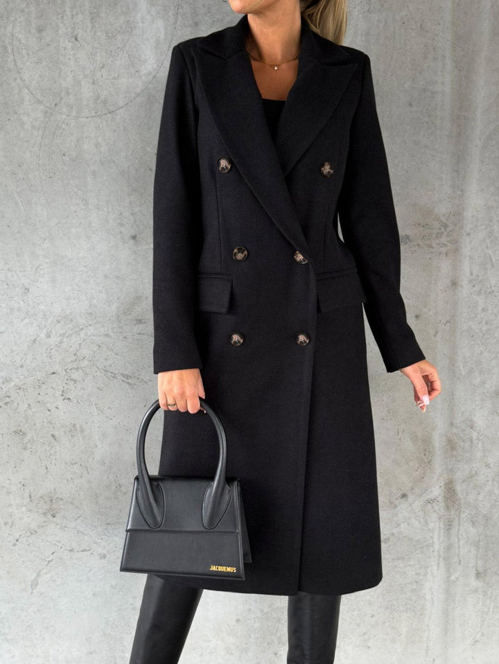 Woman in long double-breasted coat