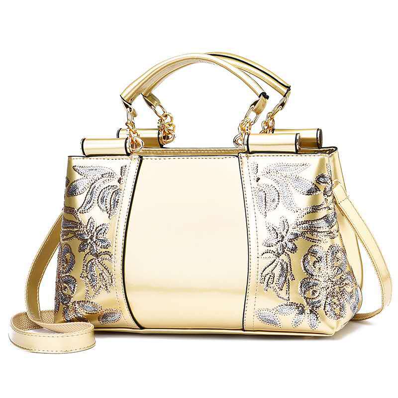 Sequin embroidered patent evening handbag
