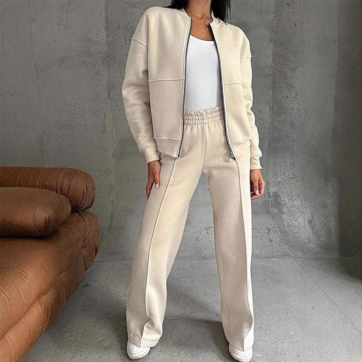 Woman in a zip jacket and wide-leg trousers set