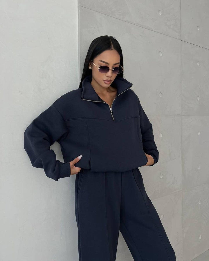 Woman in a fleece half-zip tracksuit