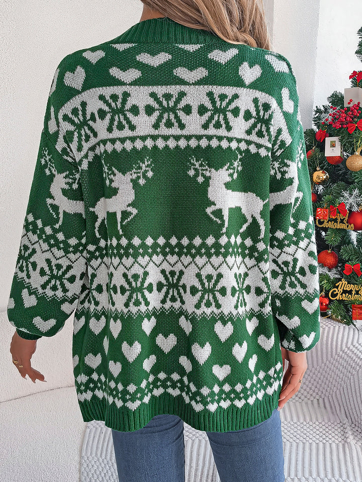 Woman in a reindeer Christmas cardigan