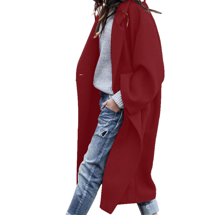 Woman wearing long oversized lapel coat