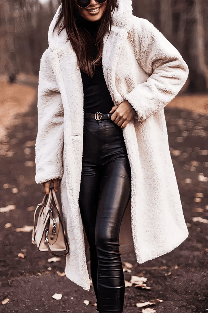 Long coat with elegant faux fur warmth and Timeless style
